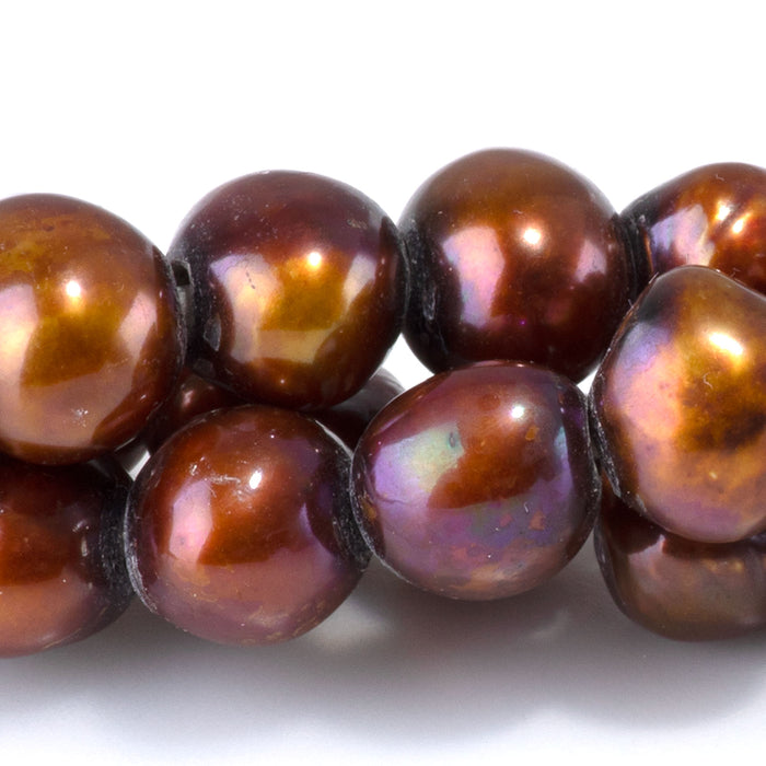 This is a Dakota Stones 8-11mm Freshwater Pearl Red Brown Gold Gemstone strand with irregular beads in 8 inch strand.