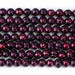 This is a Dakota Stones 8-9mm Freshwater Pearl Purple Pink Potato Gemstone strand of round beads in 15-16 inch strand.