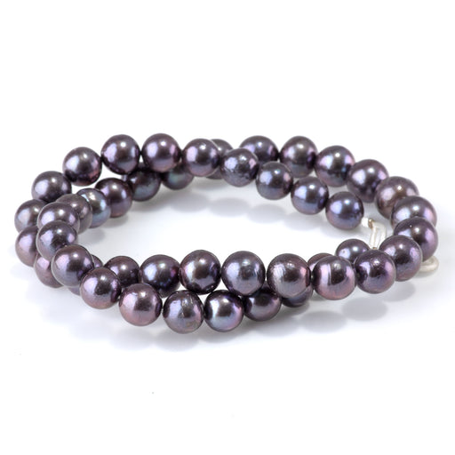This is a Dakota Stones 9-10mm Freshwater Pearl Peacock Edison Gemstone strand with round beads in 15-16 inch strand.