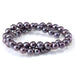This is a Dakota Stones 9-10mm Freshwater Pearl Peacock Edison Gemstone strand with round beads in 15-16 inch strand.
