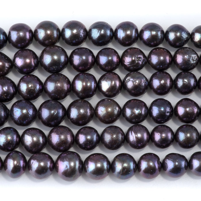 This is a Dakota Stones 9-10mm Freshwater Pearl Peacock Edison Gemstone strand with round beads in 15-16 inch strand.