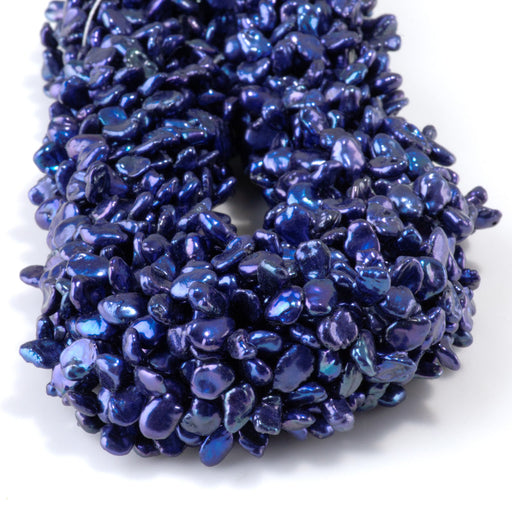This is a Dakota Stones 4-7mm Special Price Freshwater Pearl strand with blue keshi beads in 15-16 inch strand.