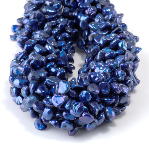 This is a Dakota Stones 5-8mm Special Price Freshwater Pearl strand with blue keshi beads in 15-16 inch strand.