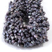 This is a Dakota Stones 5-8mm Special Price Freshwater Pearl strand with peacock keshi beads in 15-16 inch strand.