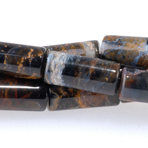 This is a Dakota Stones 6x13mm Gold Red Pietersite Tube Gemstone strand with AAA grade beads in 17-18 inch strand.