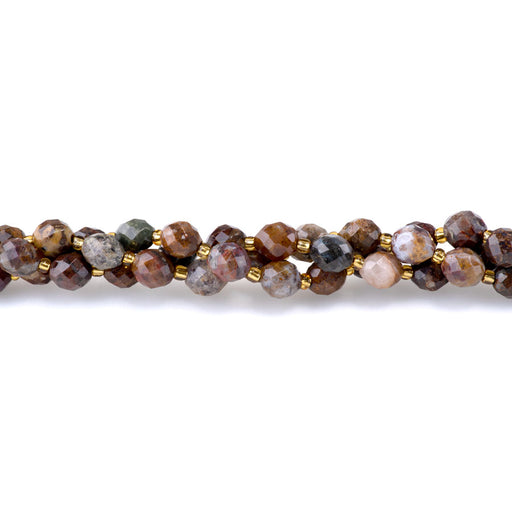 This is a Dakota Stones 7x8mm Pietersite Microfaceted Egg Gemstone strand of round beads in 15-16 inch strand.