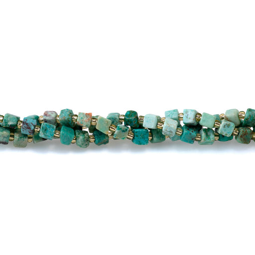 This is a Dakota Stones 5-6mm Peruvian Turquoise Gemstone strand with irregular cube beads in 15-16 inch strand.