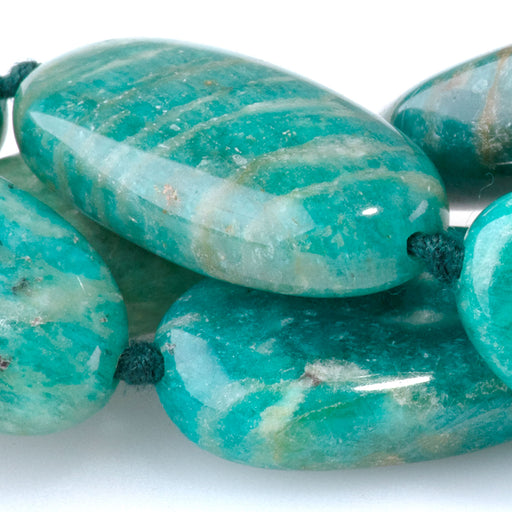 This is a Dakota Stones 12x16-13x24mm Russian Amazonite Gemstone strand with oval beads in 15-16 inch strand.