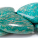 This is a Dakota Stones 15x20-18x25mm Russian Amazonite Red Matrix Gemstone strand with oval beads in 15-16 inch strand.