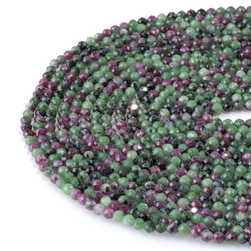 This is a Dakota Stones 4mm Ruby Zoisite Gemstone strand with faceted round beads in 15-16 inch strand.