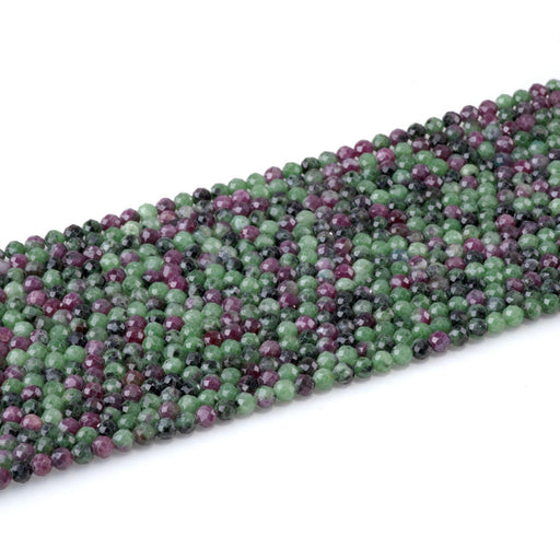 This is a Dakota Stones 4mm Ruby Zoisite Gemstone strand with faceted round beads in 15-16 inch strand.