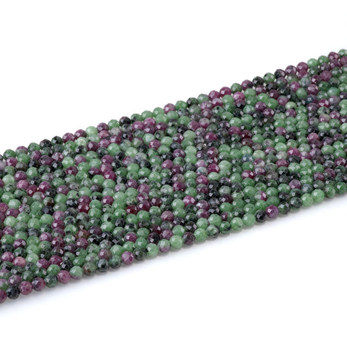This is a Dakota Stones 4mm Ruby Zoisite Gemstone strand with faceted round beads in 15-16 inch strand.