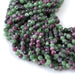 This is a Dakota Stones 4mm Ruby Zoisite Gemstone strand with faceted round beads in 15-16 inch strand.