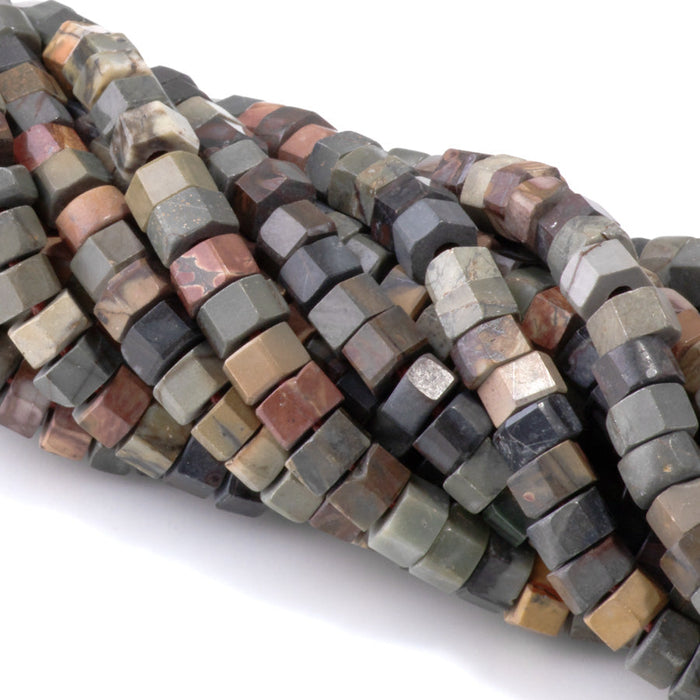 This is a Dakota Stones 6mm Red Creek Jasper Large Hole Gemstone strand with faceted hexagon beads in 8 inch strand.