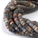 This is a Dakota Stones 6mm Red Creek Jasper Large Hole Gemstone strand with faceted hexagon beads in 8 inch strand.