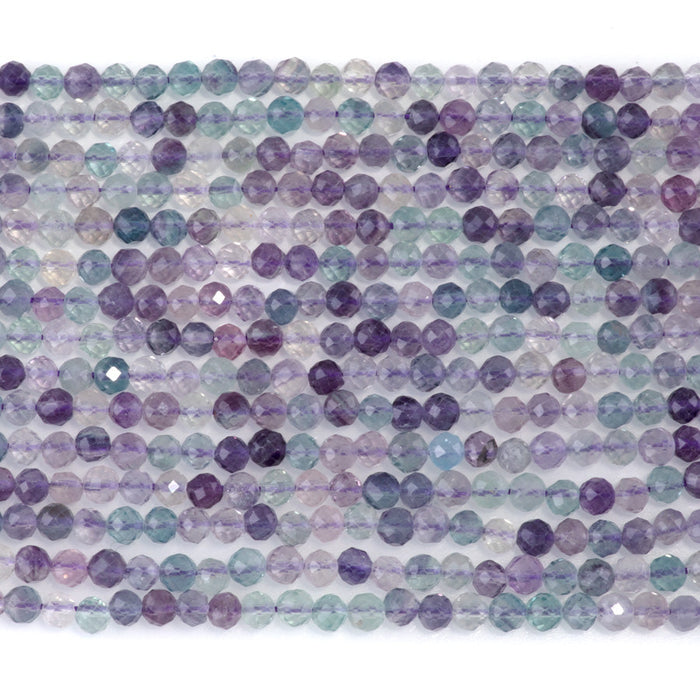 This is a Dakota Stones 4mm Rainbow Fluorite Gemstone strand with A grade microfaceted round beads in 15-16 inch strand.