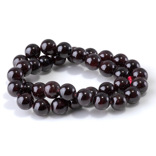 This is a Dakota Stones 10mm Red Garnet Gemstone strand with round beads in 15-16 inch strand.