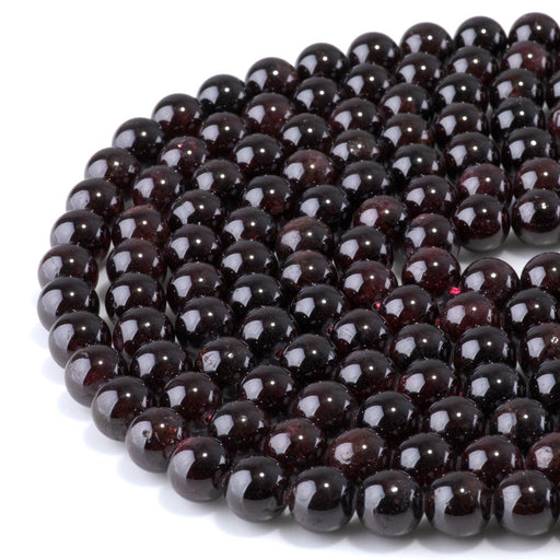 This is a Dakota Stones 10mm Red Garnet Gemstone strand with round beads in 15-16 inch strand.