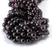 This is a Dakota Stones 10mm Red Garnet Gemstone strand with round beads in 15-16 inch strand.