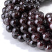 This is a Dakota Stones 10mm Red Garnet Gemstone strand with round beads in 15-16 inch strand.