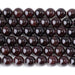 This is a Dakota Stones 10mm Red Garnet Gemstone strand with round beads in 15-16 inch strand.