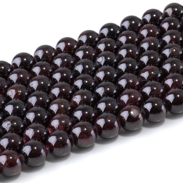 This is a Dakota Stones 10mm Red Garnet Gemstone strand with round beads in 15-16 inch strand.