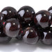 This is a Dakota Stones 10mm Red Garnet Gemstone strand with round beads in 15-16 inch strand.