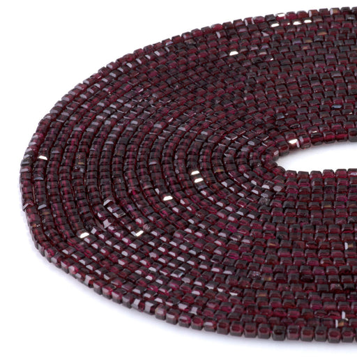 This is a Dakota Stones 3mm Red Garnet Gemstone strand with A grade table-cut cube beads in 15-16 inch strand.
