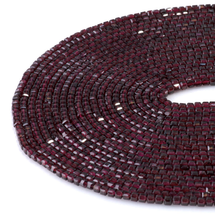 This is a Dakota Stones 3mm Red Garnet Gemstone strand with A grade table-cut cube beads in 15-16 inch strand.
