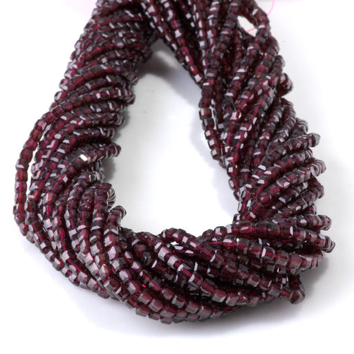 This is a Dakota Stones 3mm Red Garnet Gemstone strand with A grade table-cut cube beads in 15-16 inch strand.