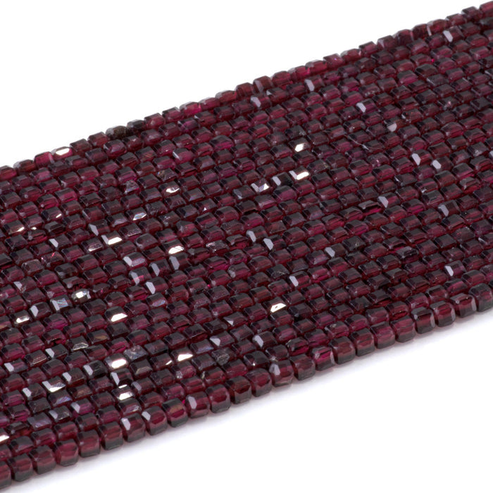 This is a Dakota Stones 3mm Red Garnet Gemstone strand with A grade table-cut cube beads in 15-16 inch strand.