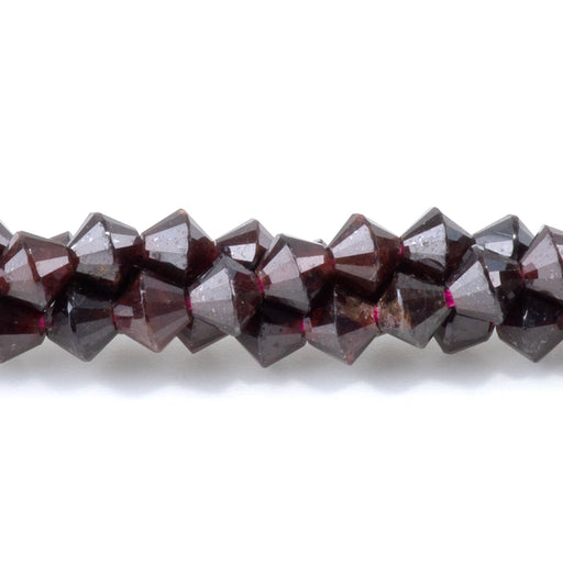 This is a Dakota Stones 4mm Red Garnet Bicone Gemstone strand with faceted beads in 15-16 inch strand.
