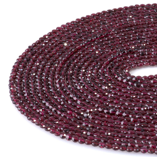 This is a Dakota Stones 4mm Red Garnet Gemstone strand with faceted coin beads in 15-16 inch strand.