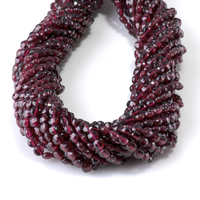 This is a Dakota Stones 4mm Red Garnet Gemstone strand with faceted coin beads in 15-16 inch strand.