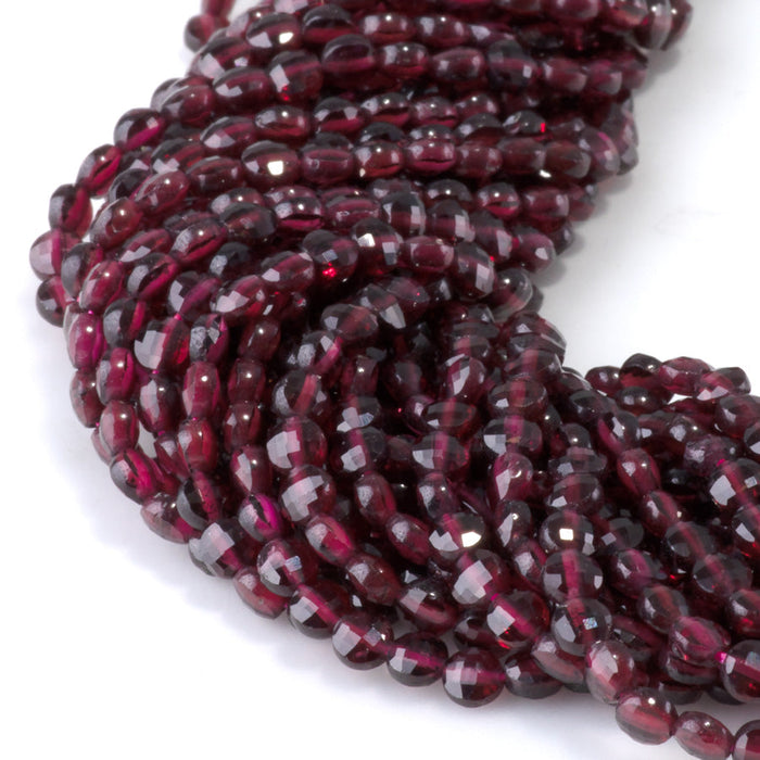 This is a Dakota Stones 4mm Red Garnet Gemstone strand with faceted coin beads in 15-16 inch strand.