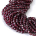 This is a Dakota Stones 4mm Red Garnet Gemstone strand with faceted coin beads in 15-16 inch strand.