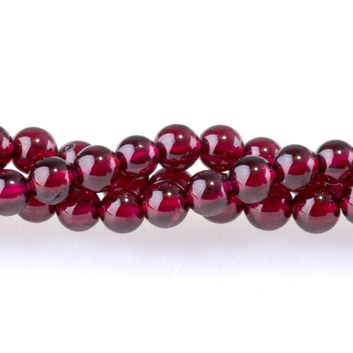 This is a Dakota Stones 4mm Red Garnet Gemstone strand with AA grade round beads in 15-16 inch strand.
