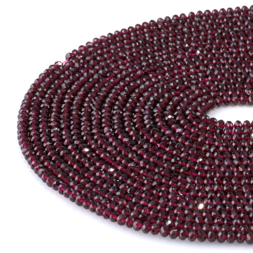 This is a Dakota Stones 3x4mm Red Garnet Gemstone strand with faceted rondelle beads in 15-16 inch strand.
