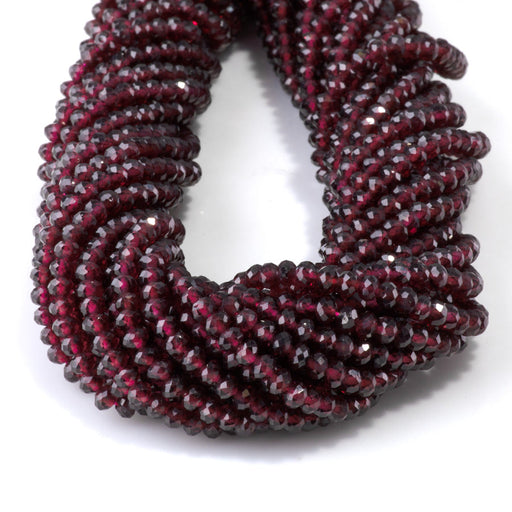 This is a Dakota Stones 3x4mm Red Garnet Gemstone strand with faceted rondelle beads in 15-16 inch strand.