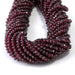 This is a Dakota Stones 3x4mm Red Garnet Gemstone strand with faceted rondelle beads in 15-16 inch strand.
