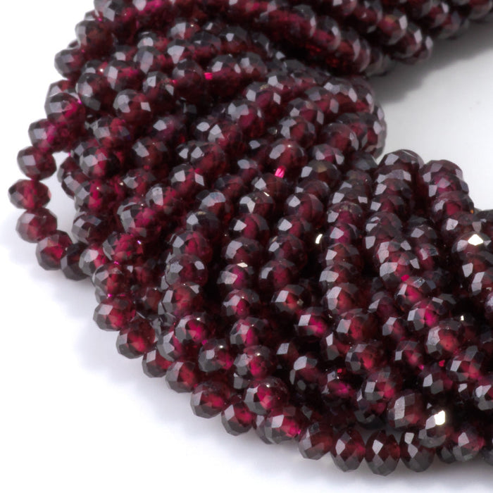 This is a Dakota Stones 3x4mm Red Garnet Gemstone strand with faceted rondelle beads in 15-16 inch strand.
