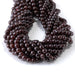 This is a Dakota Stones 6mm Red Garnet Gemstone strand with AA grade round beads in 15-16 inch strand.