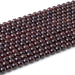 This is a Dakota Stones 6mm Red Garnet Gemstone strand with AA grade round beads in 15-16 inch strand.
