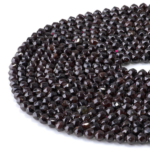 This is a Dakota Stones 6mm Red Garnet Gemstone strand with double heart faceted round beads in 15-16 inch strand.