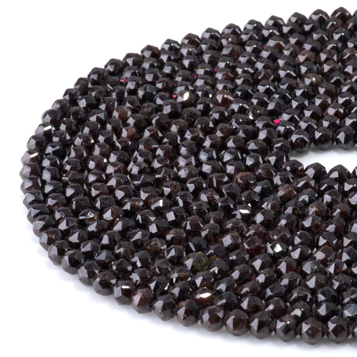 This is a Dakota Stones 6mm Red Garnet Gemstone strand with double heart faceted round beads in 15-16 inch strand.