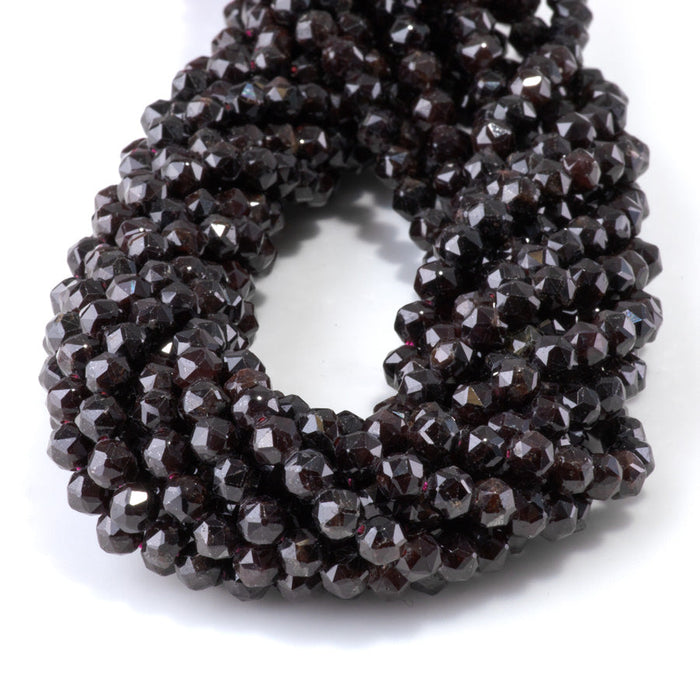 This is a Dakota Stones 6mm Red Garnet Gemstone strand with double heart faceted round beads in 15-16 inch strand.