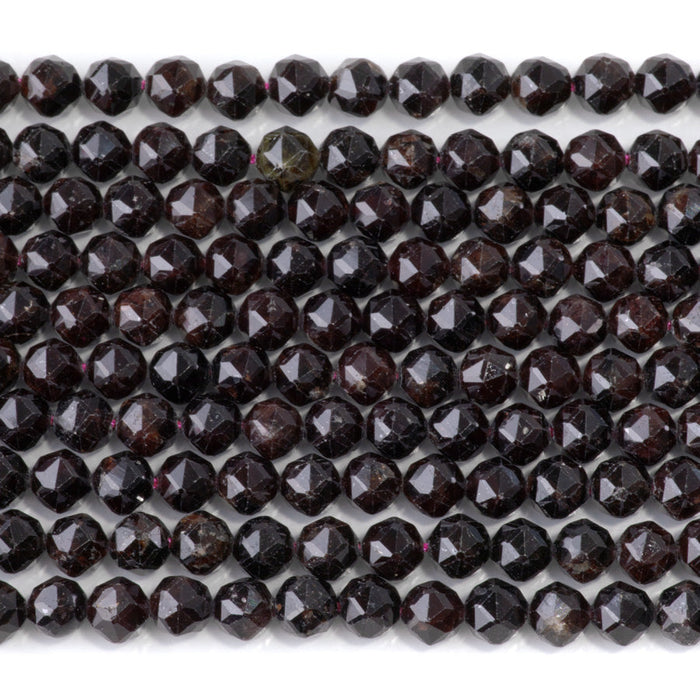 This is a Dakota Stones 6mm Red Garnet Gemstone strand with double heart faceted round beads in 15-16 inch strand.