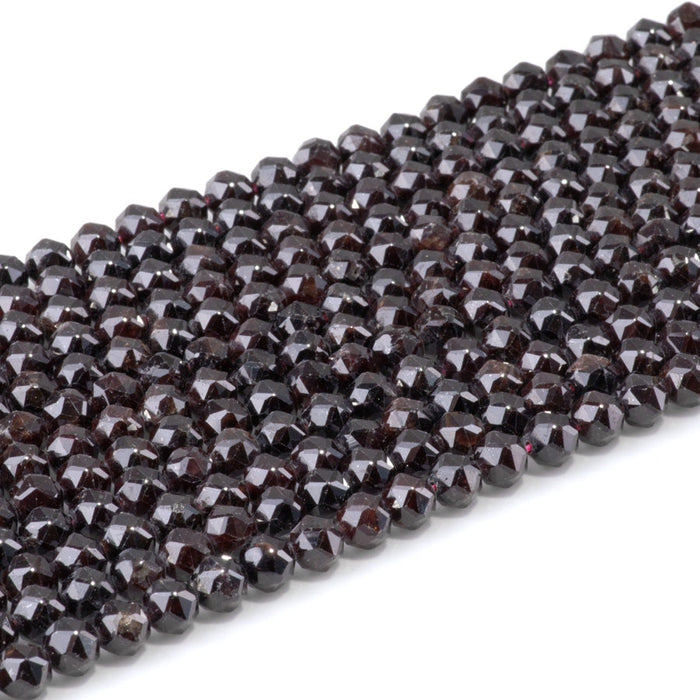 This is a Dakota Stones 6mm Red Garnet Gemstone strand with double heart faceted round beads in 15-16 inch strand.