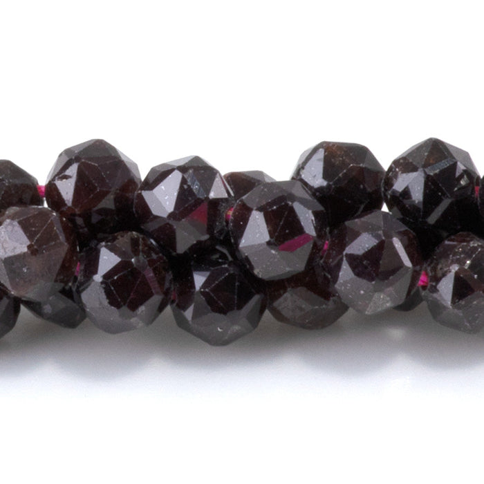 This is a Dakota Stones 6mm Red Garnet Gemstone strand with double heart faceted round beads in 15-16 inch strand.
