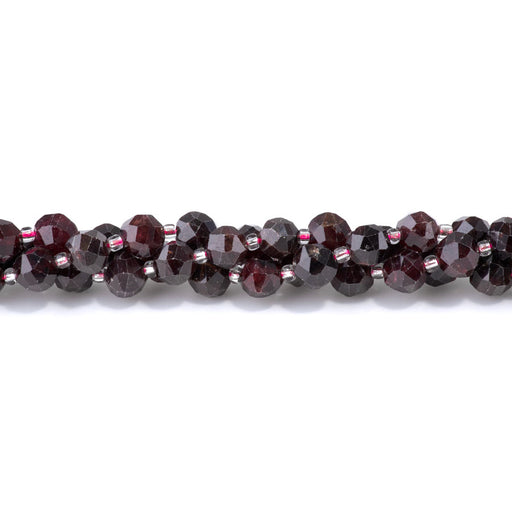This is a Dakota Stones 7x8mm Red Garnet Gemstone strand with faceted nugget beads in 15-16 inch strand.
